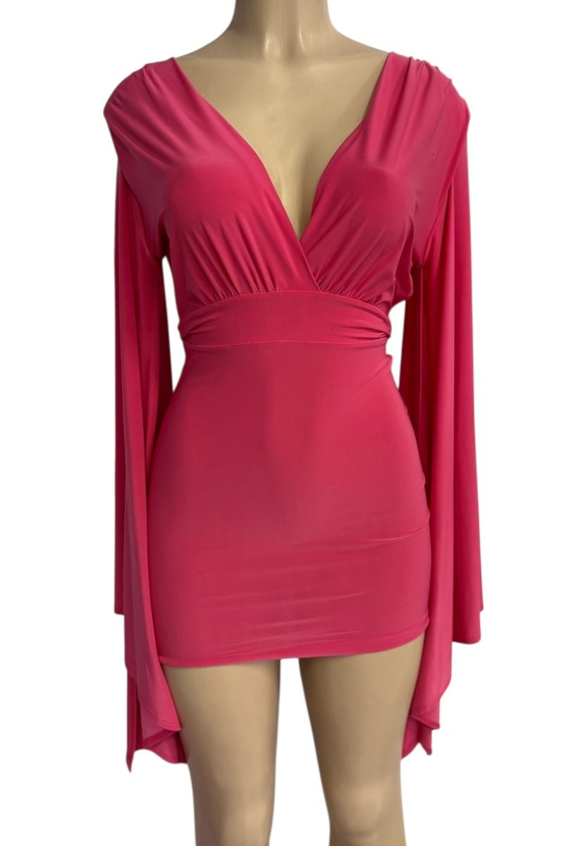 Pink dress on a mannequin against a white background