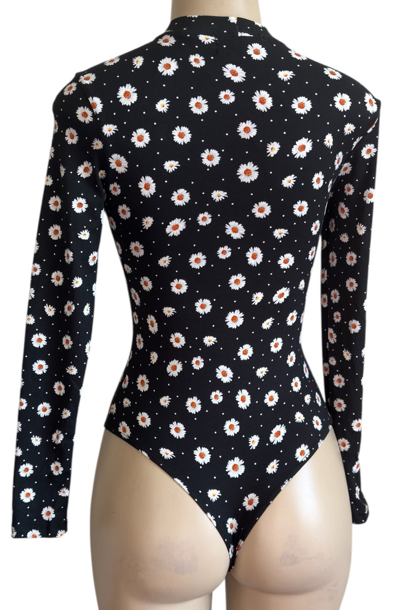 Black bodysuit with floral pattern on a mannequin