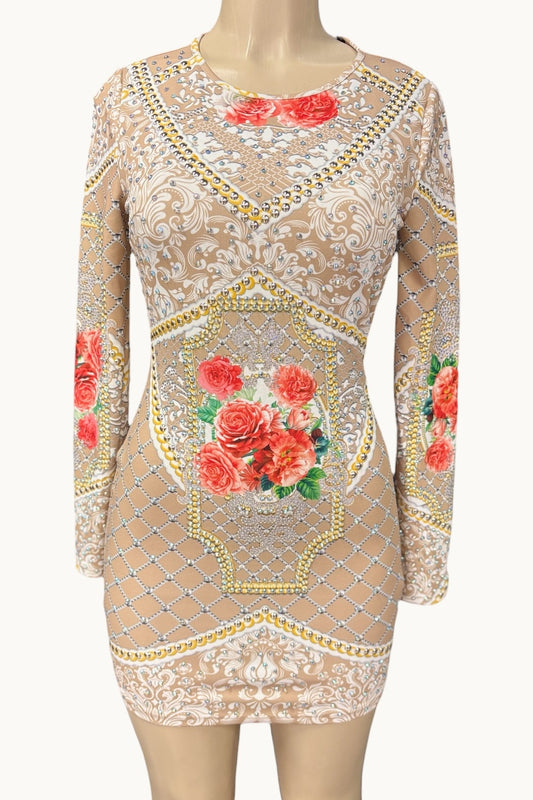 Beige dress with floral embroidery on a mannequin against a white background