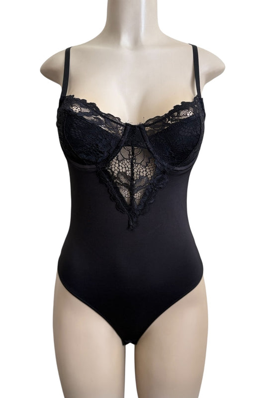 Black lace bodysuit on a mannequin against a white background