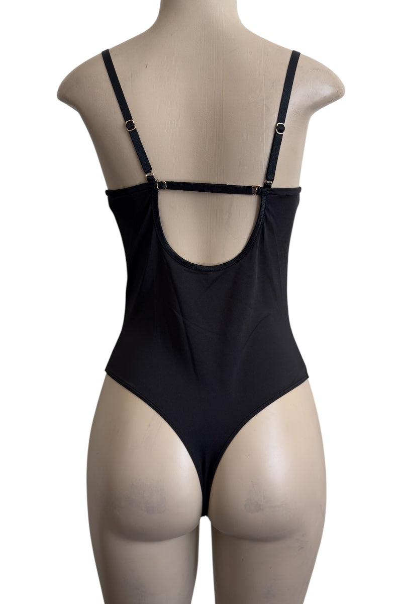 Black bodysuit on a mannequin against a white background