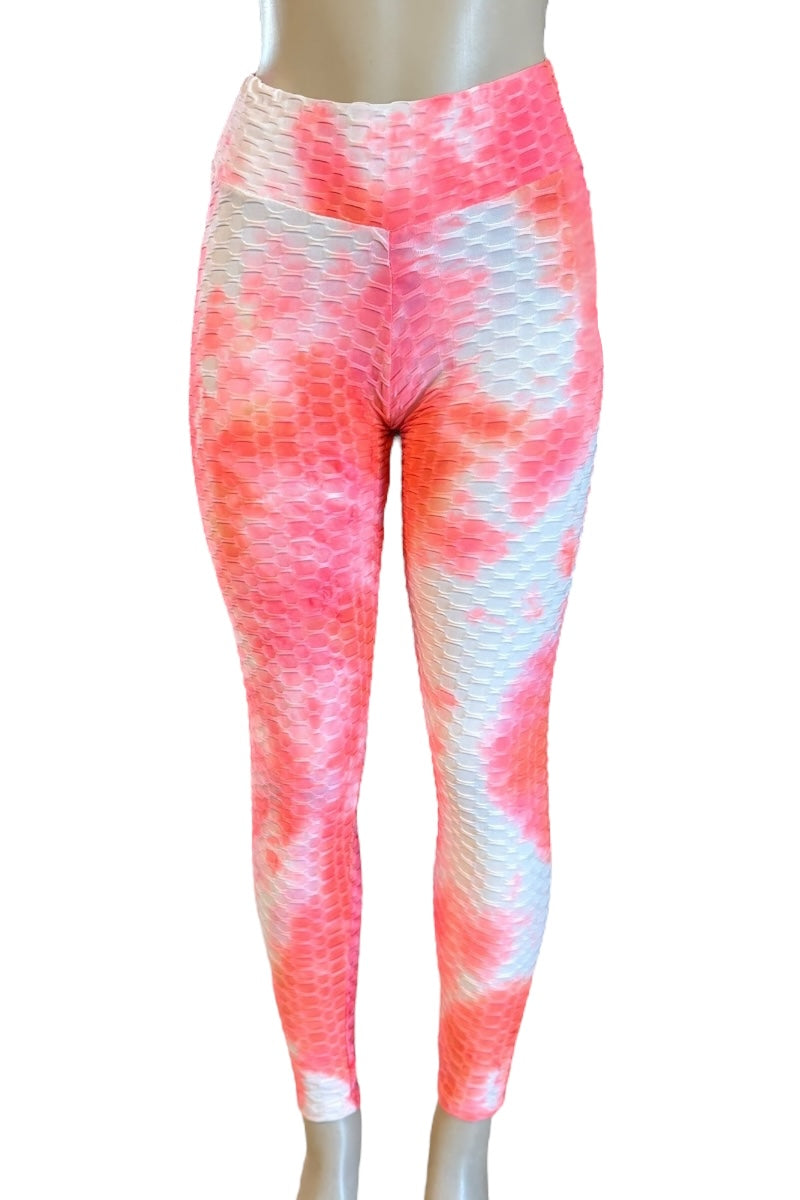Tie-dye leggings with pink, white, and blue pattern on a mannequin against a white background