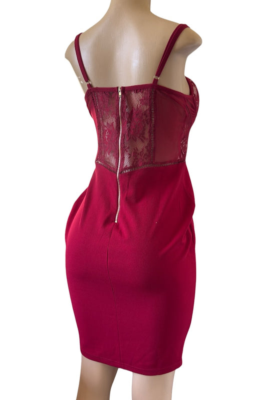 burgundy dress with lace detailing on a white background