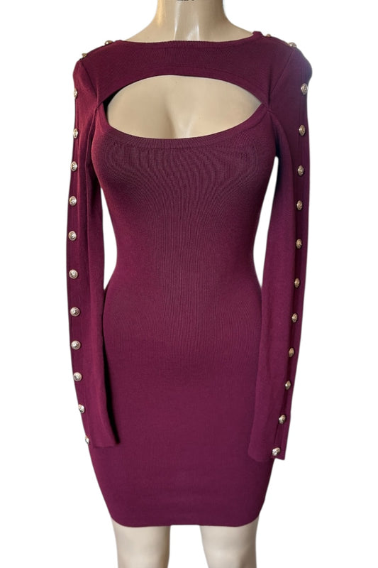 Burgundy dress with cut-out back and studded details on a mannequin against a white background