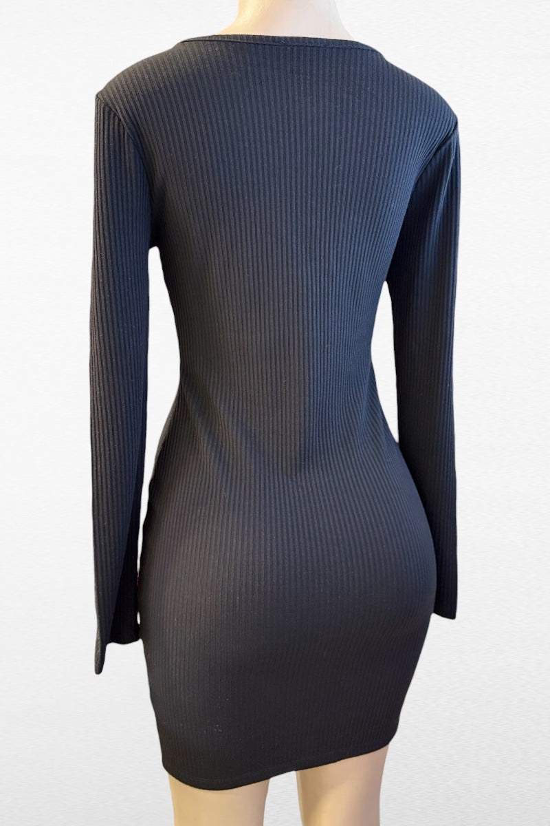 Black ribbed dress on a mannequin against a white background