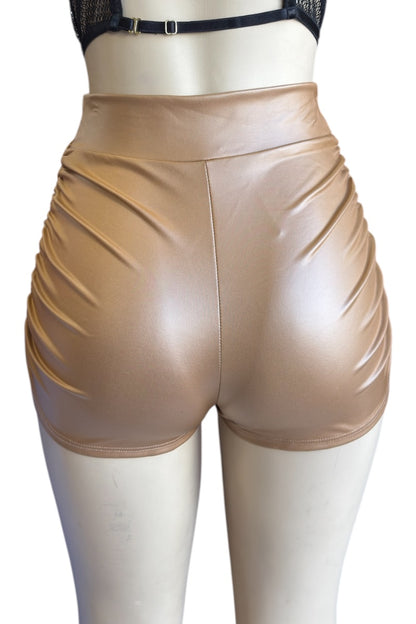 faux leather shorts on a mannequin against a white background