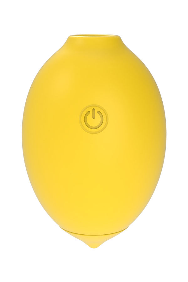 A bright yellow, lemon-shaped silicone device with a power button symbol on the front, isolated on a white background.