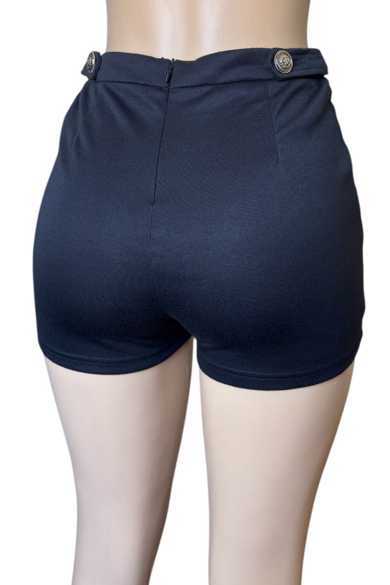 black shorts on a mannequin with a white background