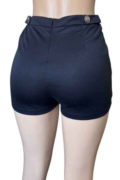 black shorts on a mannequin with a white background