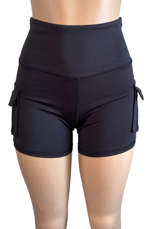 Black shorts with layered design on a white background