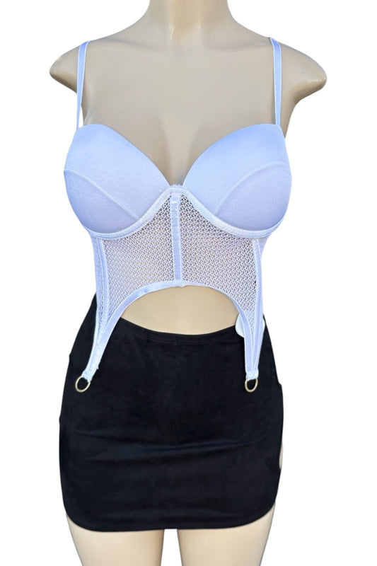 White bra top with mesh panels on a mannequin against a white background