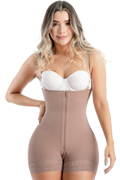 Woman wearing a cocoa shapewear bodysuit with a white bra on a white background