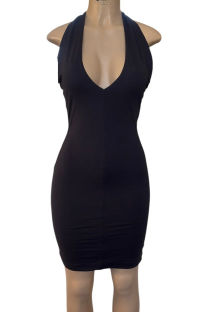 Black dress on a mannequin against a white background