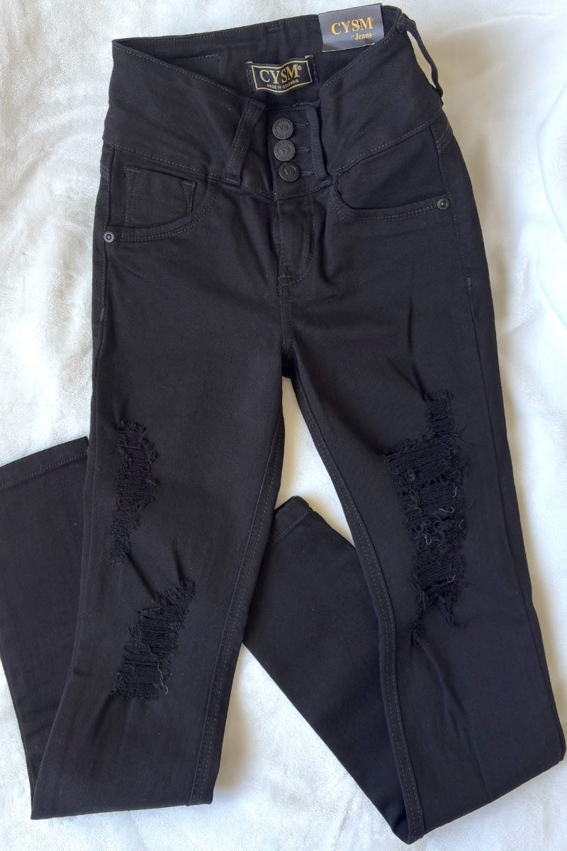 Black distressed jeans with a brand label on a white background