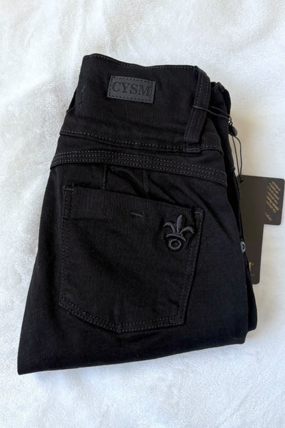 Black pants with a brand tag on a white background