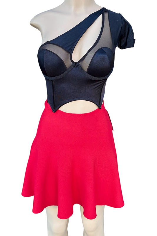 Mannequin wearing a black top with cut-out design and a red skirt on a white background