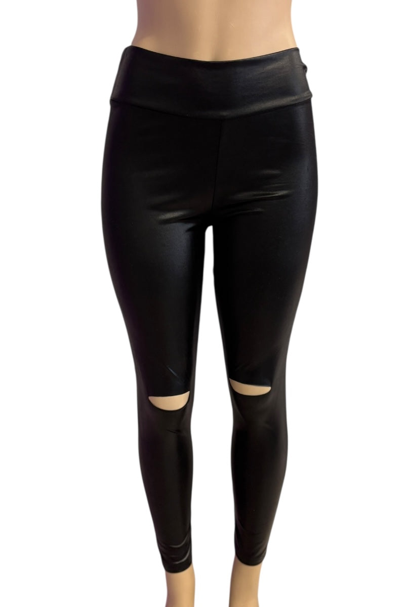 Black leggings with cut-out design on a white background