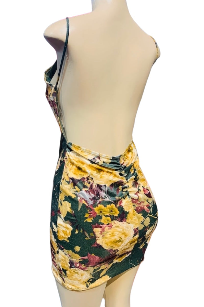 Floral dress on a mannequin with a white background