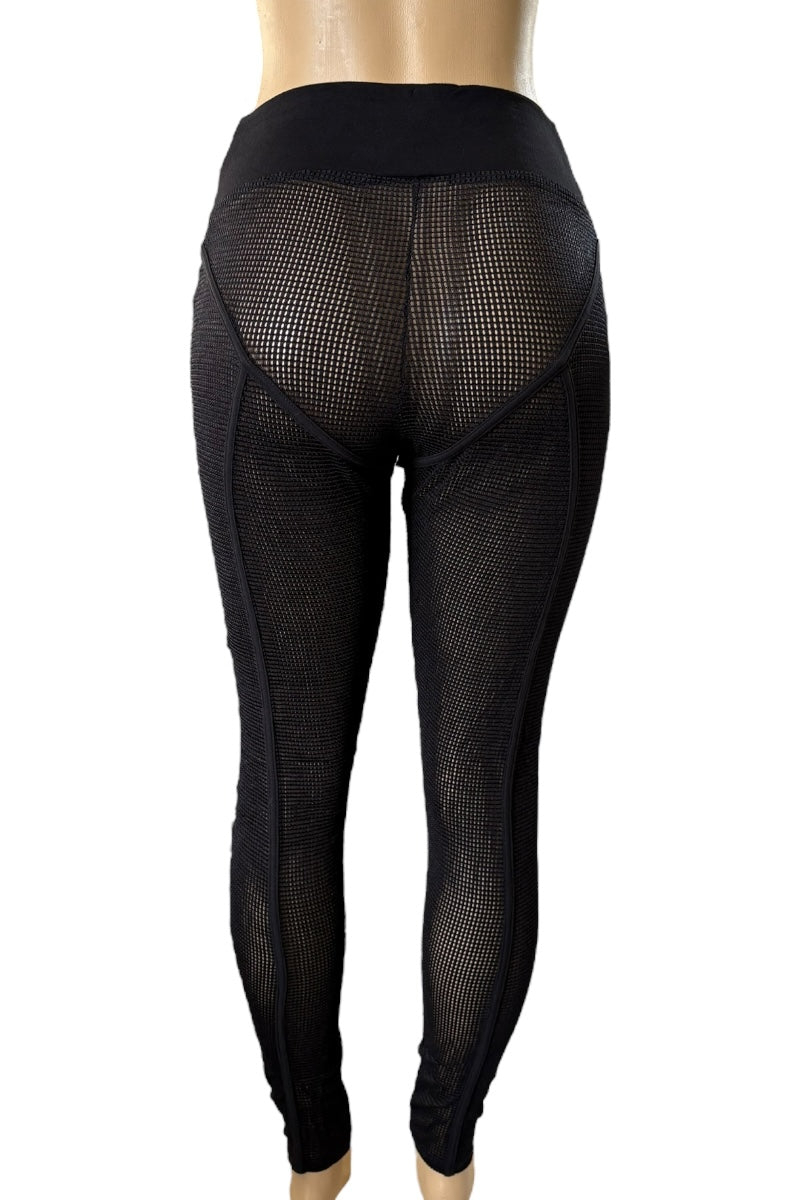 Black fishnet leggings on a mannequin against a white background