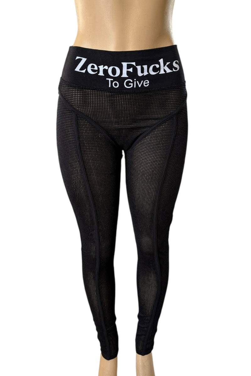 Black leggings with 'ZeroFucks To Give' text on a white background