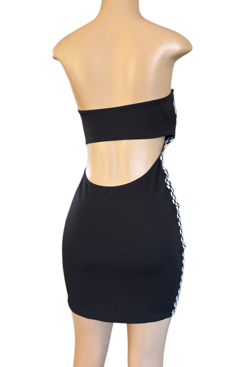 Black strapless dress with cut-out design on a mannequin against a white background