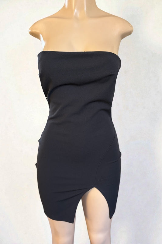 Black strapless dress on a mannequin against a white background