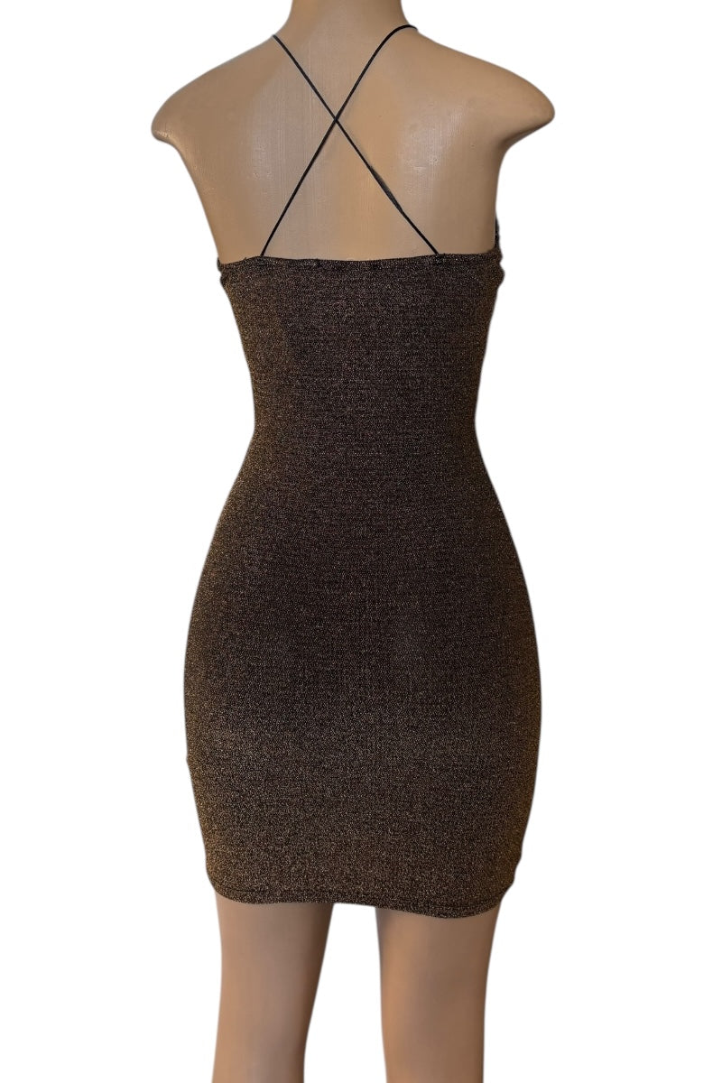 golden dress with criss-cross straps on a mannequin against a white background