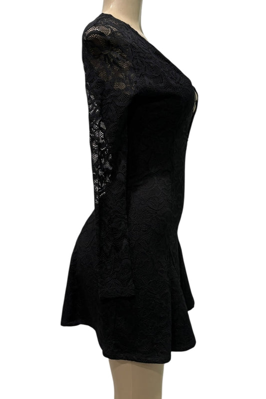 Black dress with lace sleeves on a mannequin against a white background