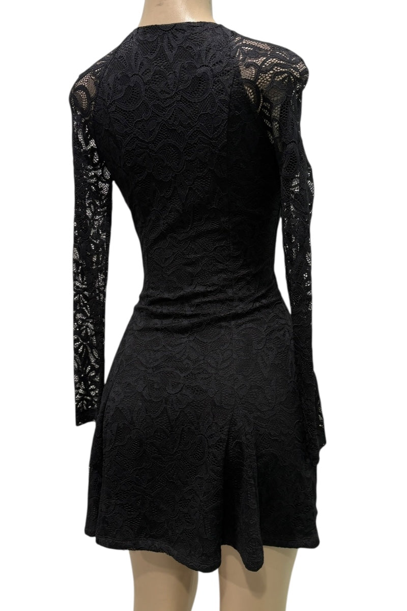 Black lace dress on a mannequin with a white background