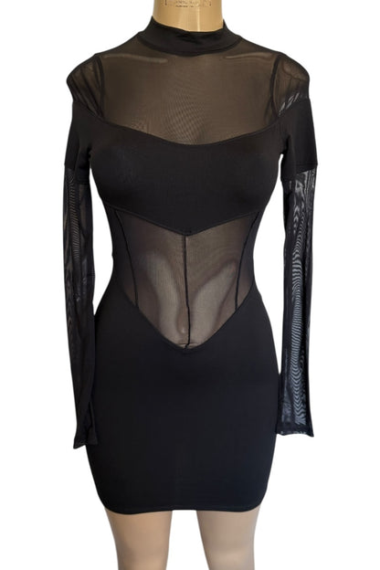 Black dress with sheer panels on a mannequin against a white background
