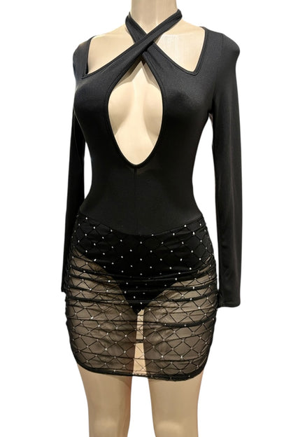 Black long-sleeve dress with a deep neckline and black sheer skirt on a mannequin against a white background