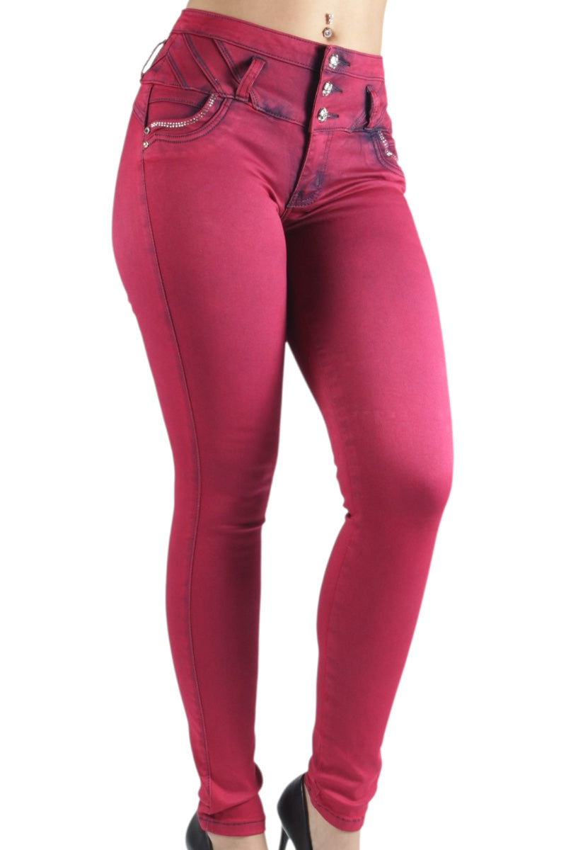 Red jeans with decorative elements on a white background