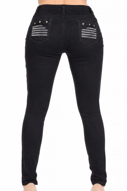 Black jeans with decorative pockets on a model