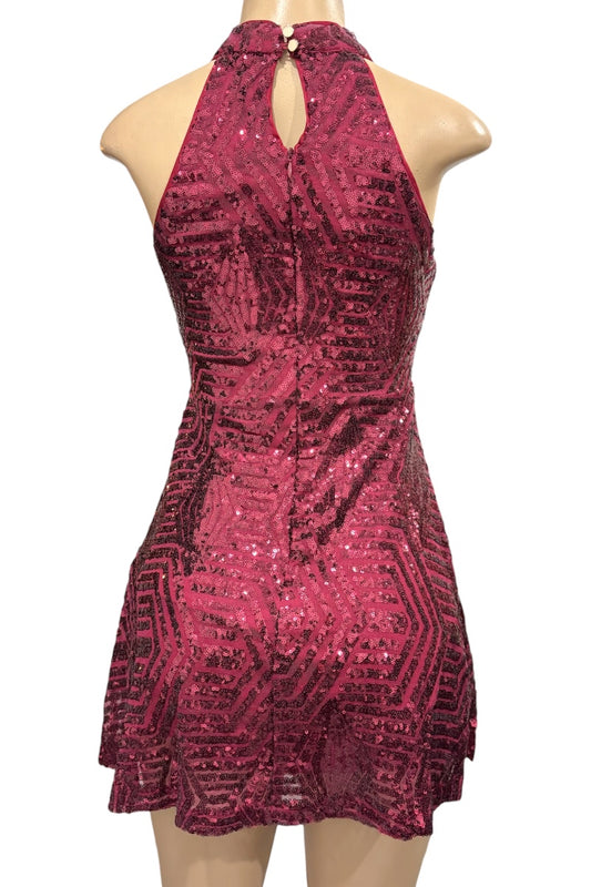 Burgundy sequin dress on a mannequin against a white background