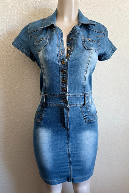 Blue denim dress on a mannequin against a beige background