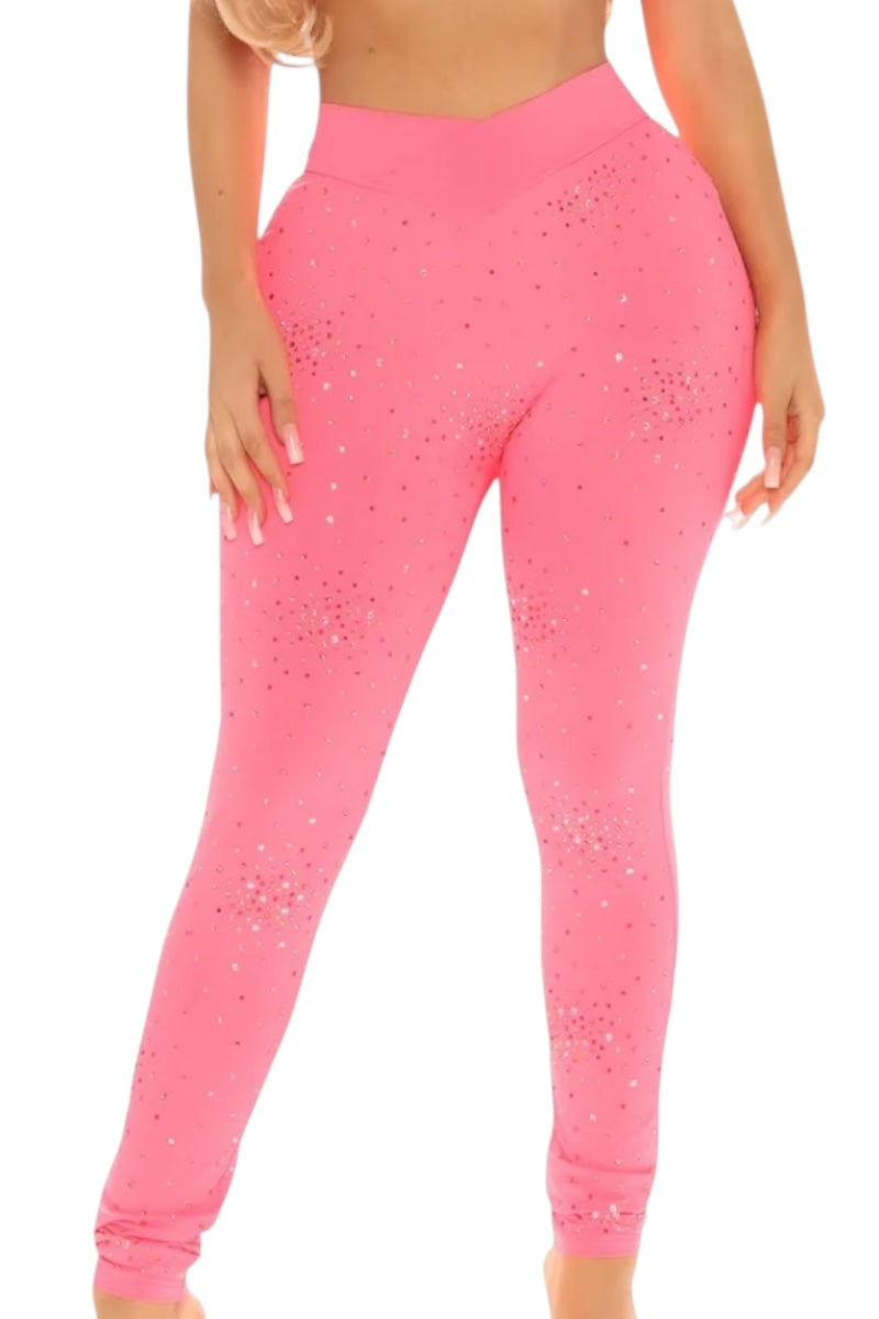 Pink leggings with rhinestone embellishments on a white background