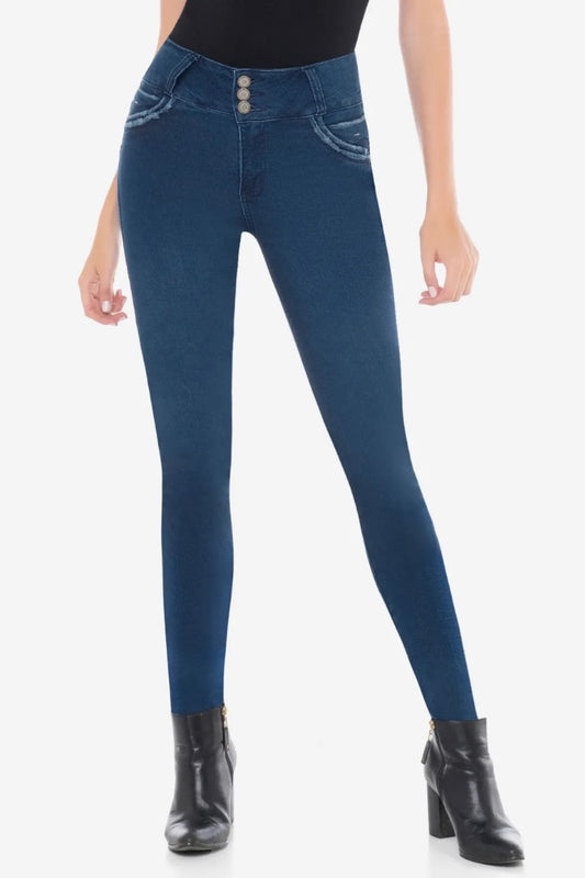 Blue jeans worn by a person on a white background