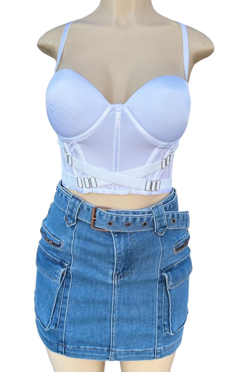 Mannequin wearing a white crop top and denim skirt on a white background