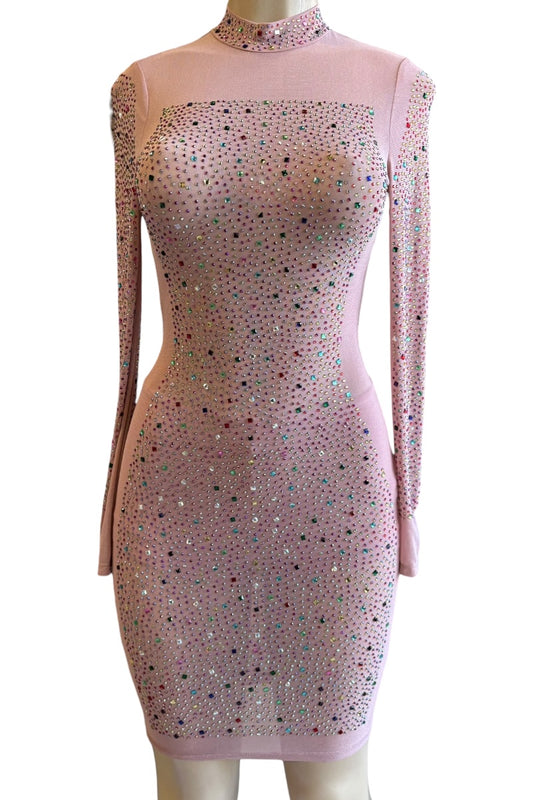 Pink dress with rhinestone detailing on a mannequin against a white background