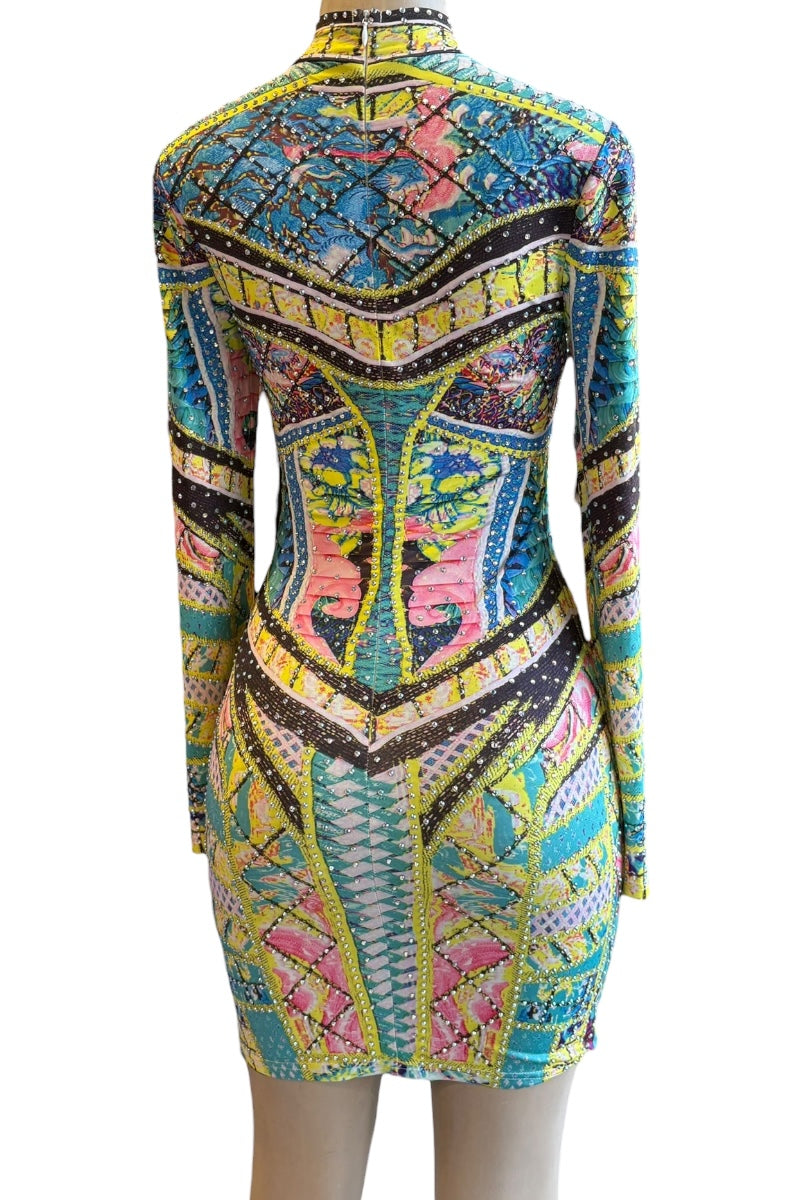 Colorful patterned dress with long sleeves on a white background