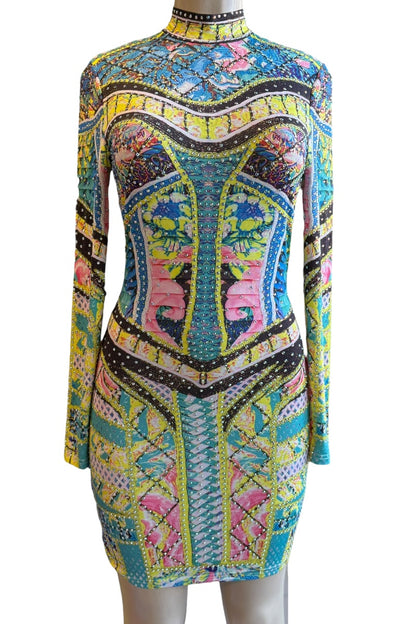 Colorful patterned dress on a mannequin against a white background