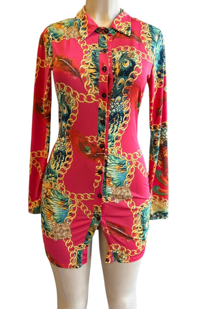 Colorful patterned dress on a mannequin against a white background