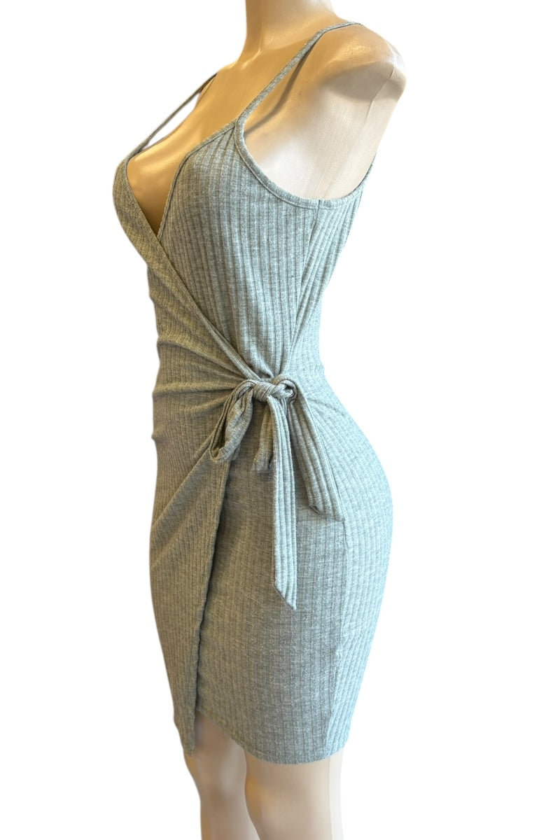 Mannequin wearing a light grey knit dress with a tie waist on a white background