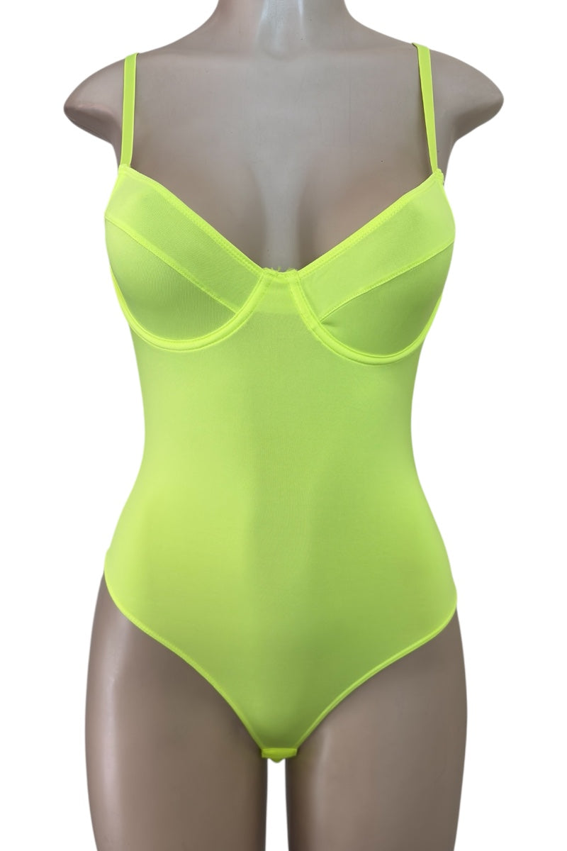 Neon yellow bodysuit on a mannequin against a white background