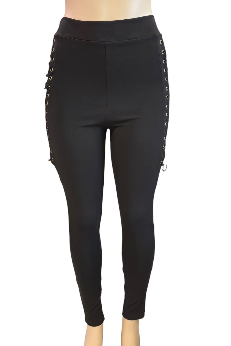 Black leggings with lace-up side panels on a white background