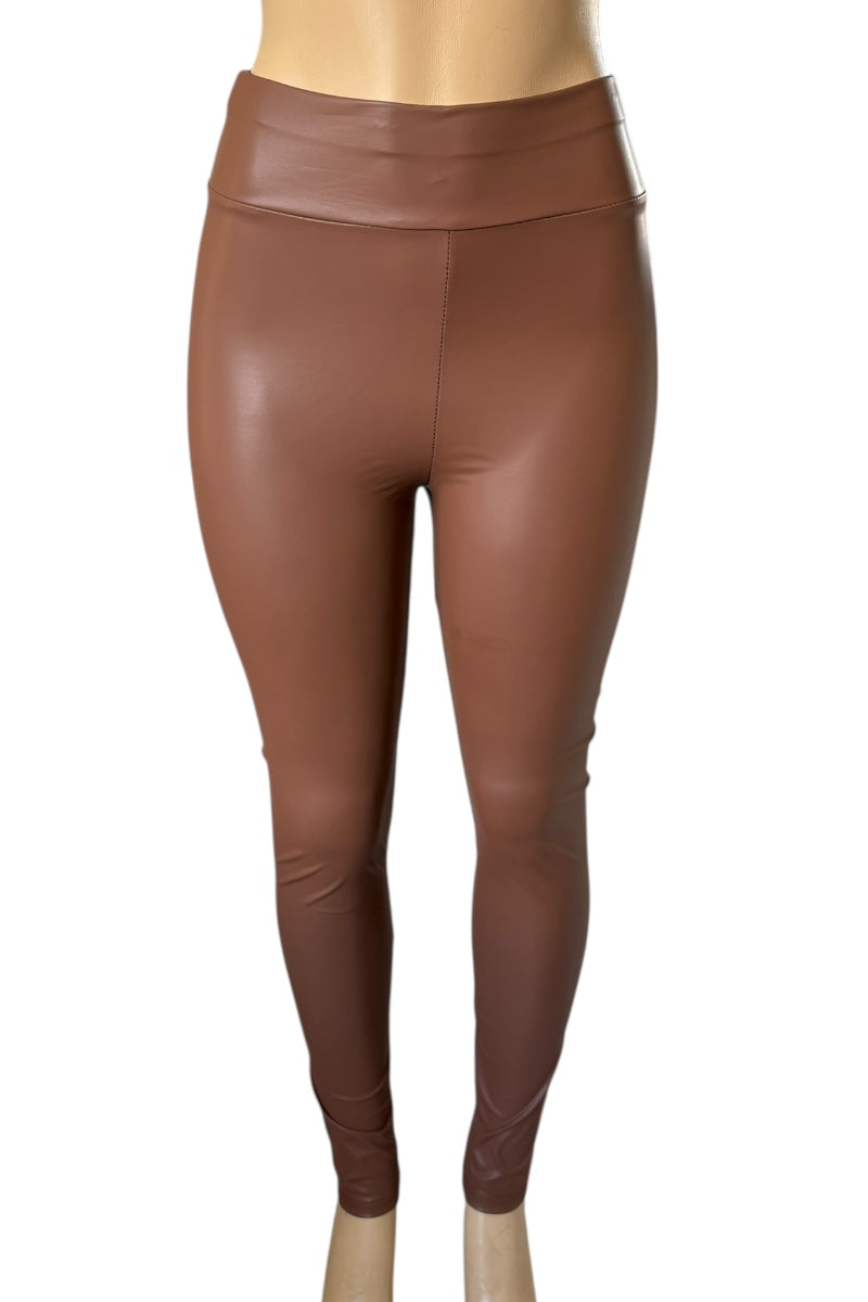 Brown faux leather leggings on a white background