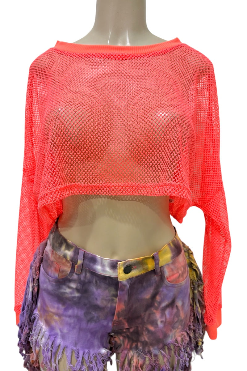 Mannequin wearing a bright orange mesh top and colorful shorts on a white background