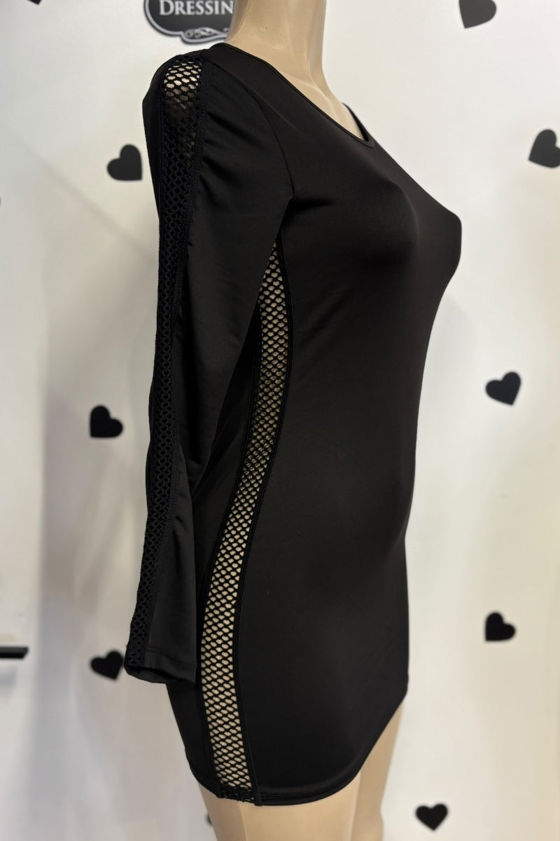 Black long-sleeve dress with mesh panels on a mannequin against a white background with black heart shapes.