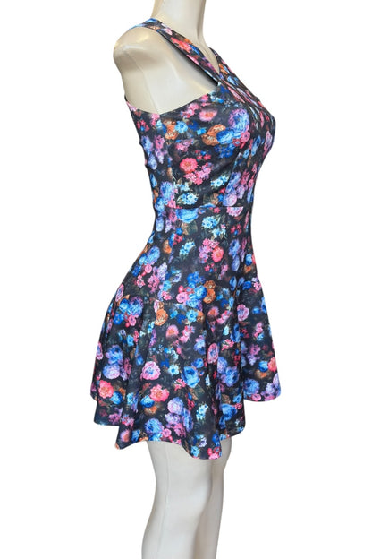 Floral dress on a mannequin against a white background