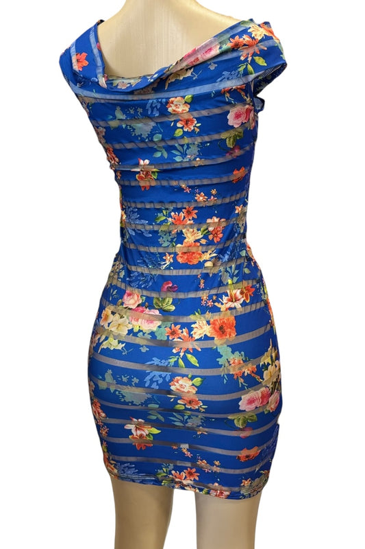 Blue floral dress on a mannequin against a white background